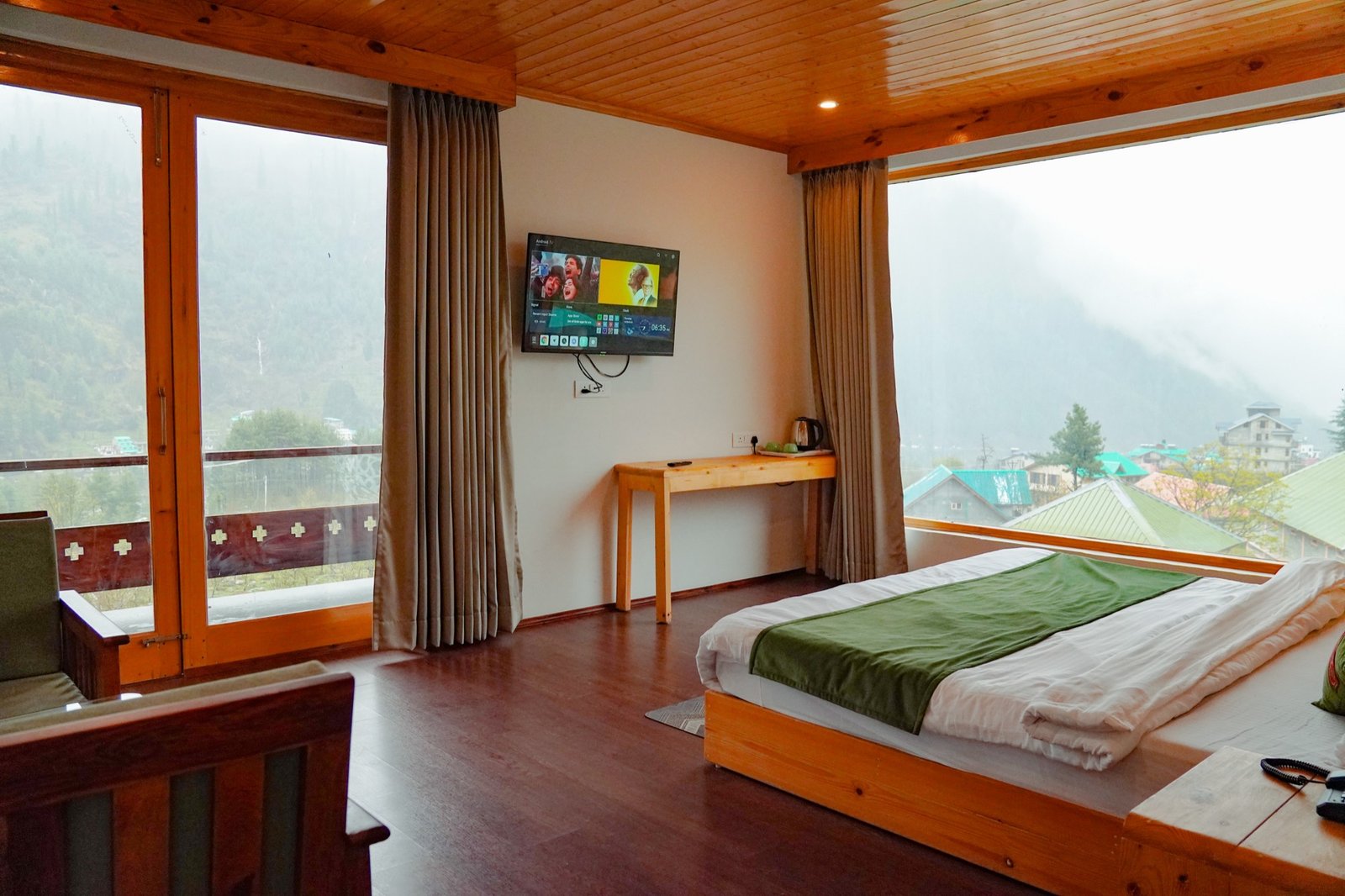 Room with a private balcony opening to the orchard
