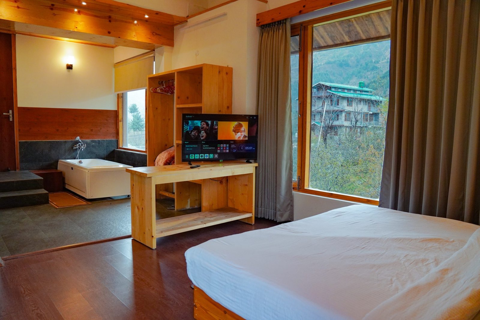 The bathtub suite, tub by the window