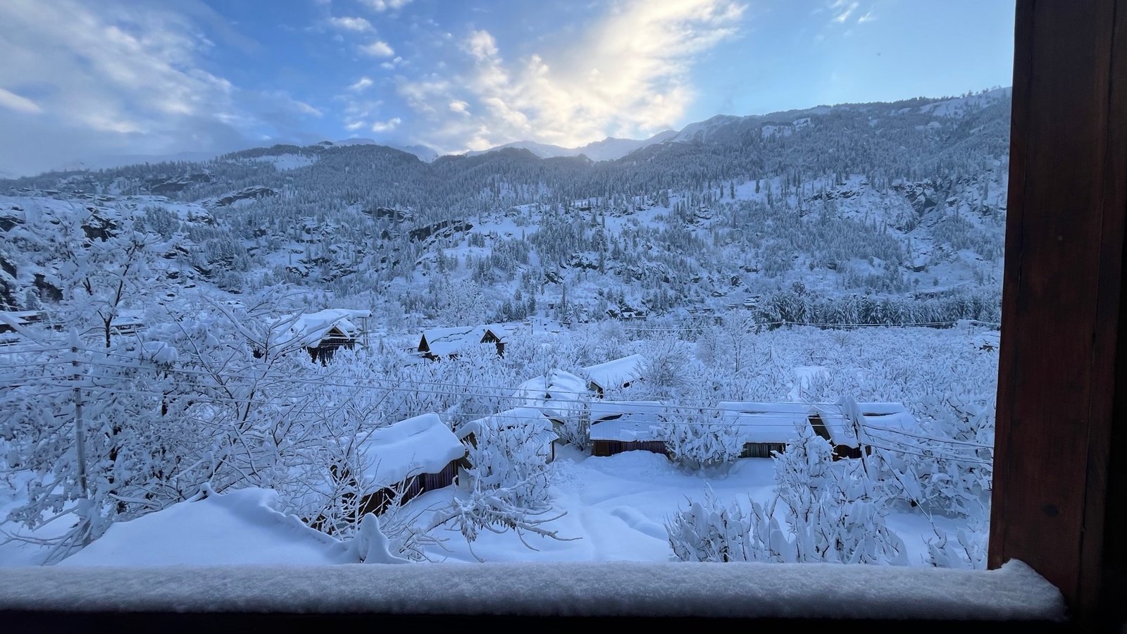 The valley under fresh snow, seen from the terrace